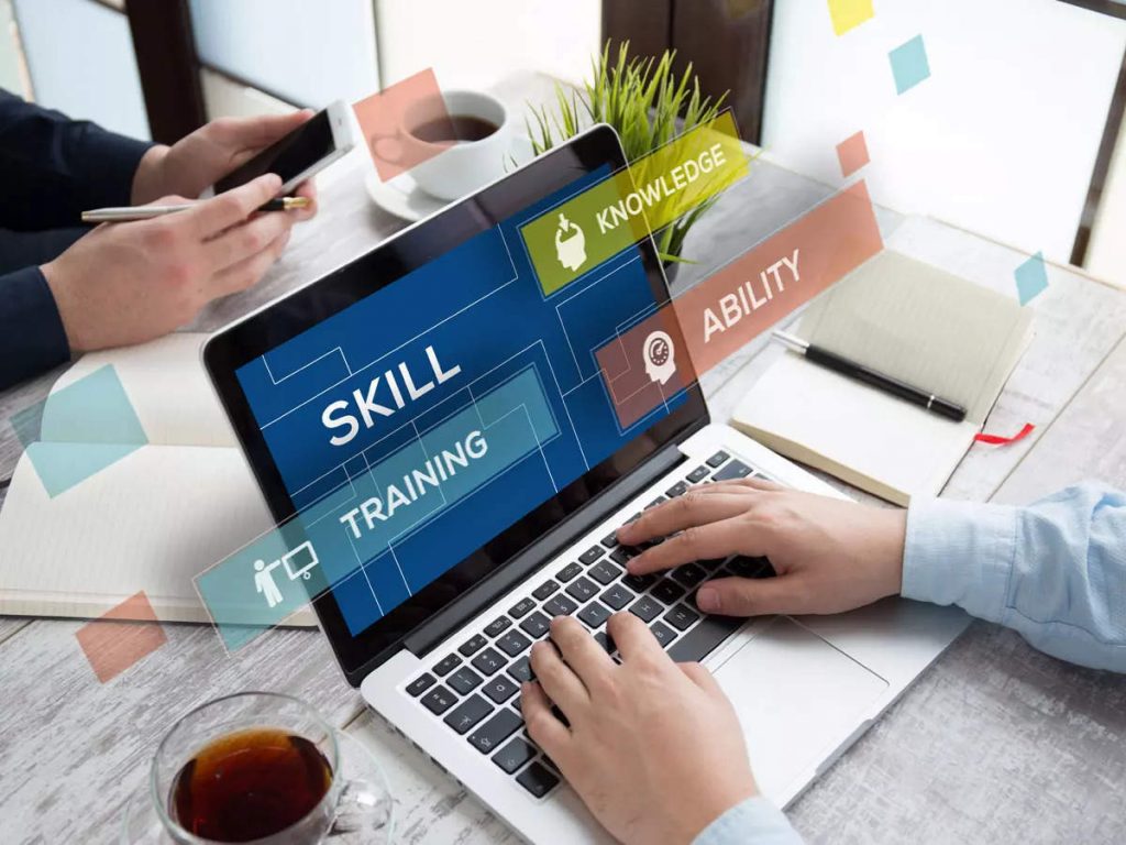 A person working on a laptop computer with a certificate icon on the screen. Pure Professional offers online certifications to advance your career.